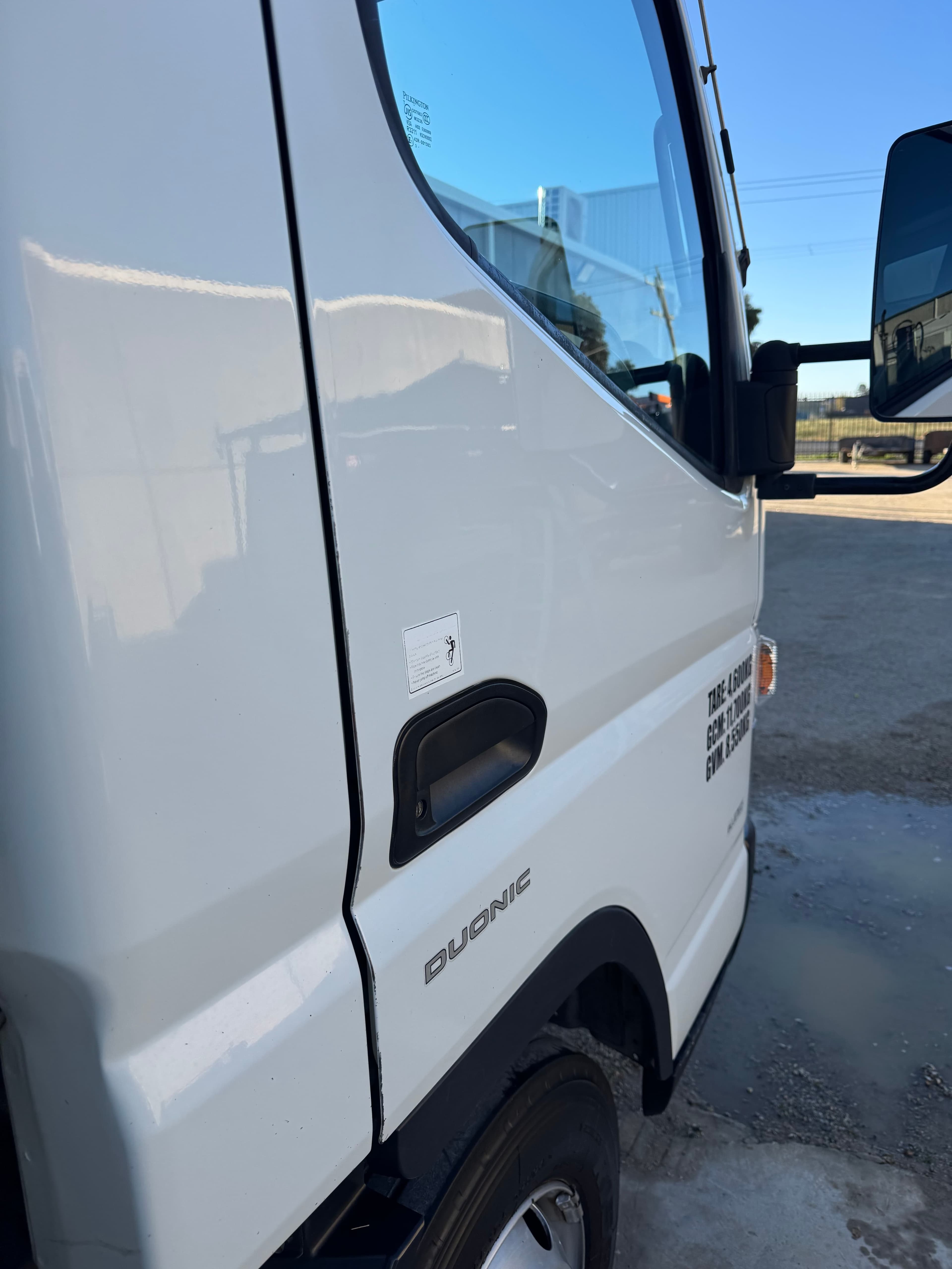 Work truck passenger side after detailing by Domma's Detailing