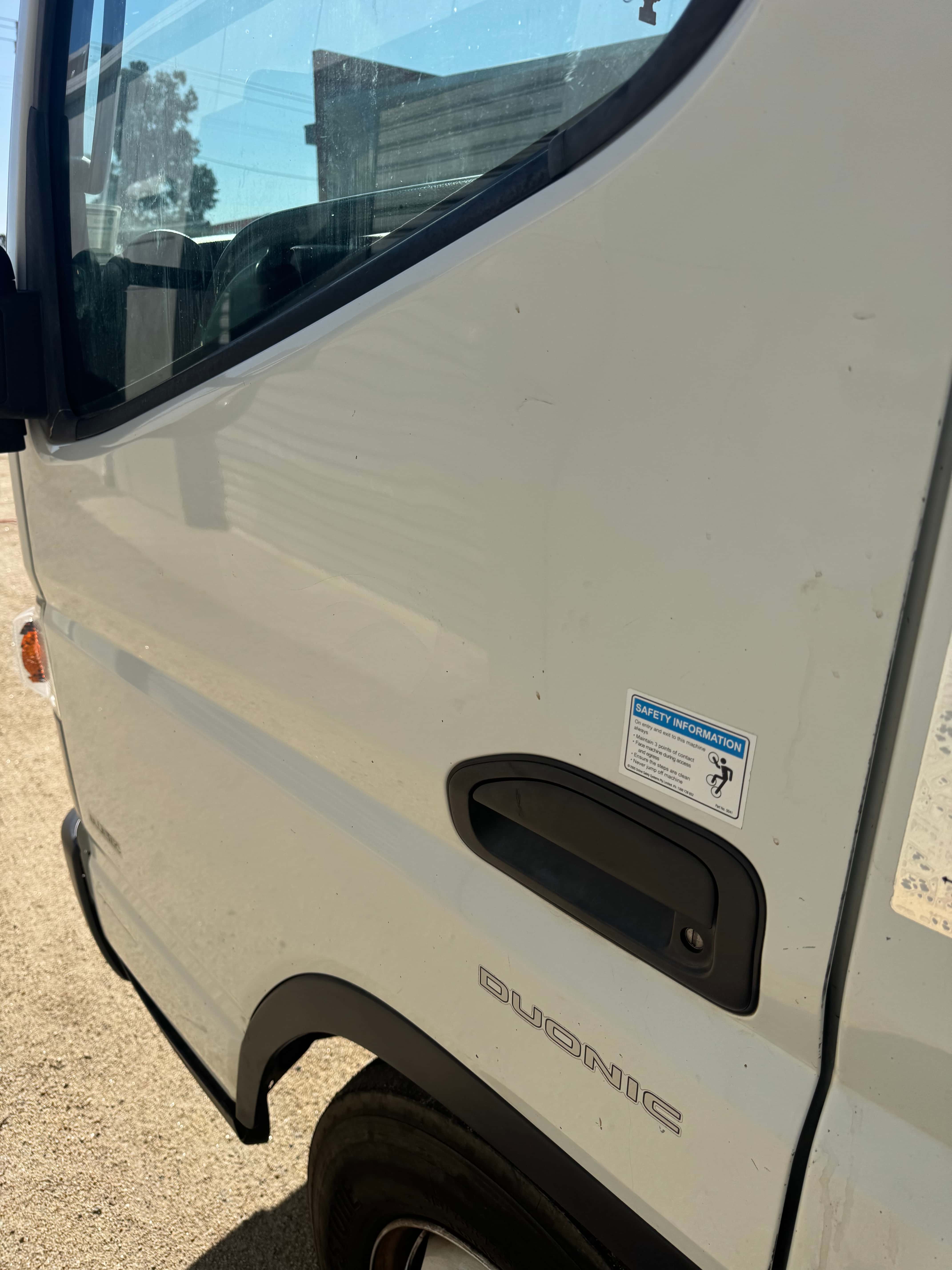 Work truck driver side before detailing by Domma's Detailing